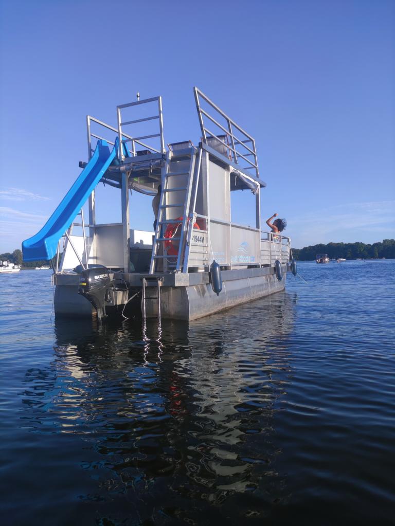 Partyboat Berlin Sunset rent with slide and bbq